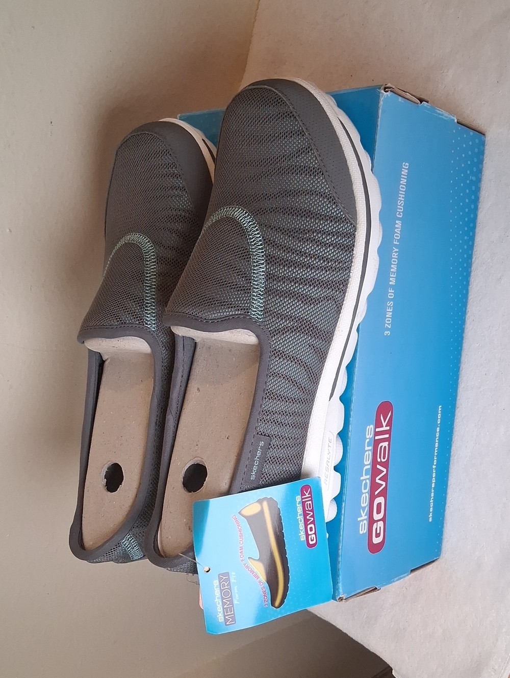 Skechers Go Walk Slip-On Sneakers in Gray with White Sole